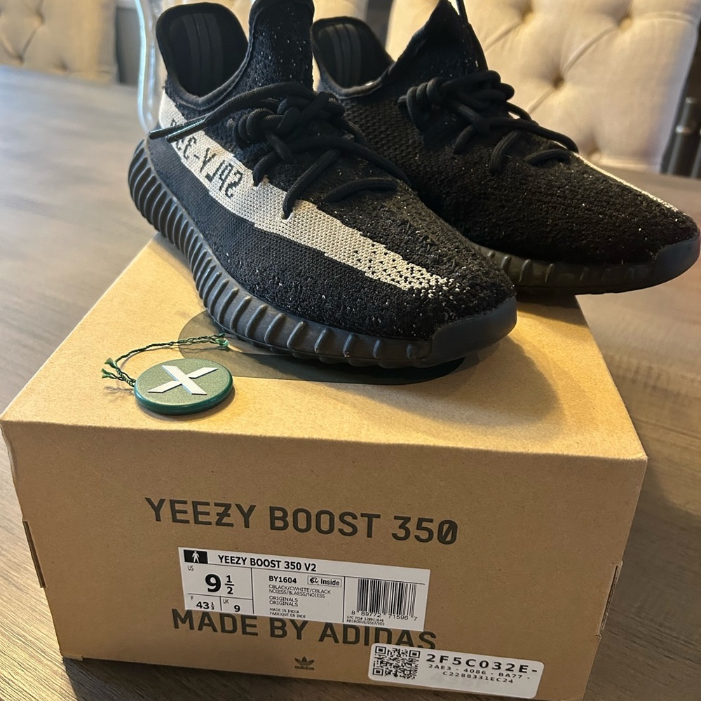 Black Athletic Shoes with Knit Upper and Curved Sole